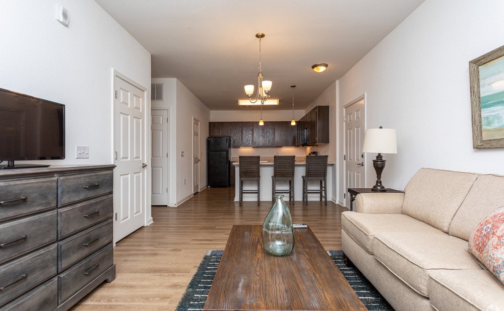 Living Room and kitchen at Waters at Gateway apartment